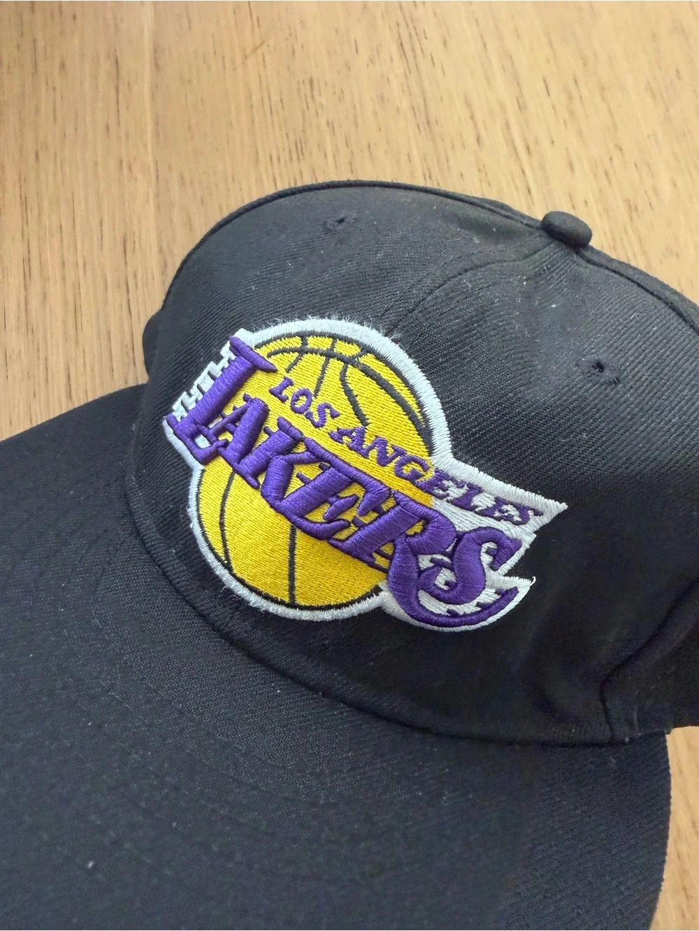 New Era Lakers Black Snapback with Purple and Gold Logo